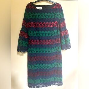 Lovely dress by Sara Campbell in size 10. Lace effect. Excellent condition